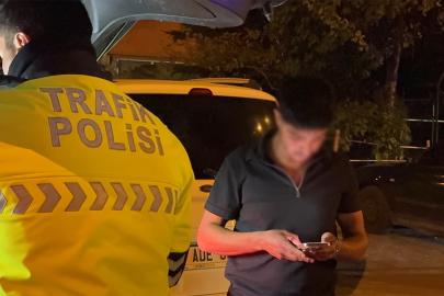 Polisin üzerine araç sürdü, "dava açarım" diyerek tehdit etti